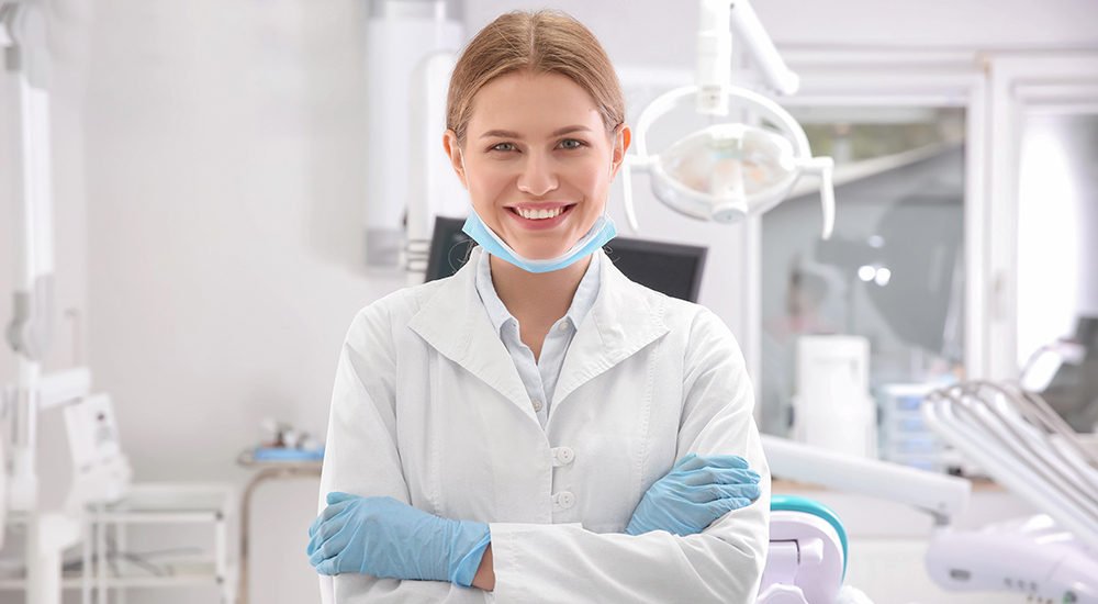 dentist standing with crossed arms