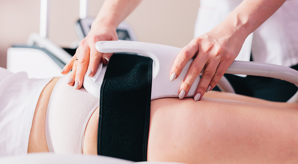 patient receiving emsculpt treatment