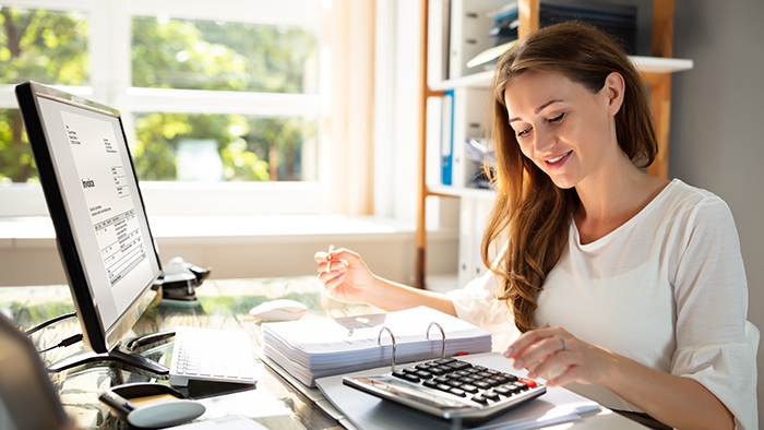 Business laptop, binder, calculator